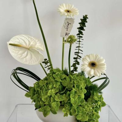 Vase  Boll vase with green and special White flowers